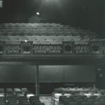 An archive image of the theatre before the tech desk was added to the back of the auditorium