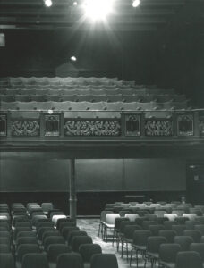 An archive image of the theatre before the tech desk was added to the back of the auditorium